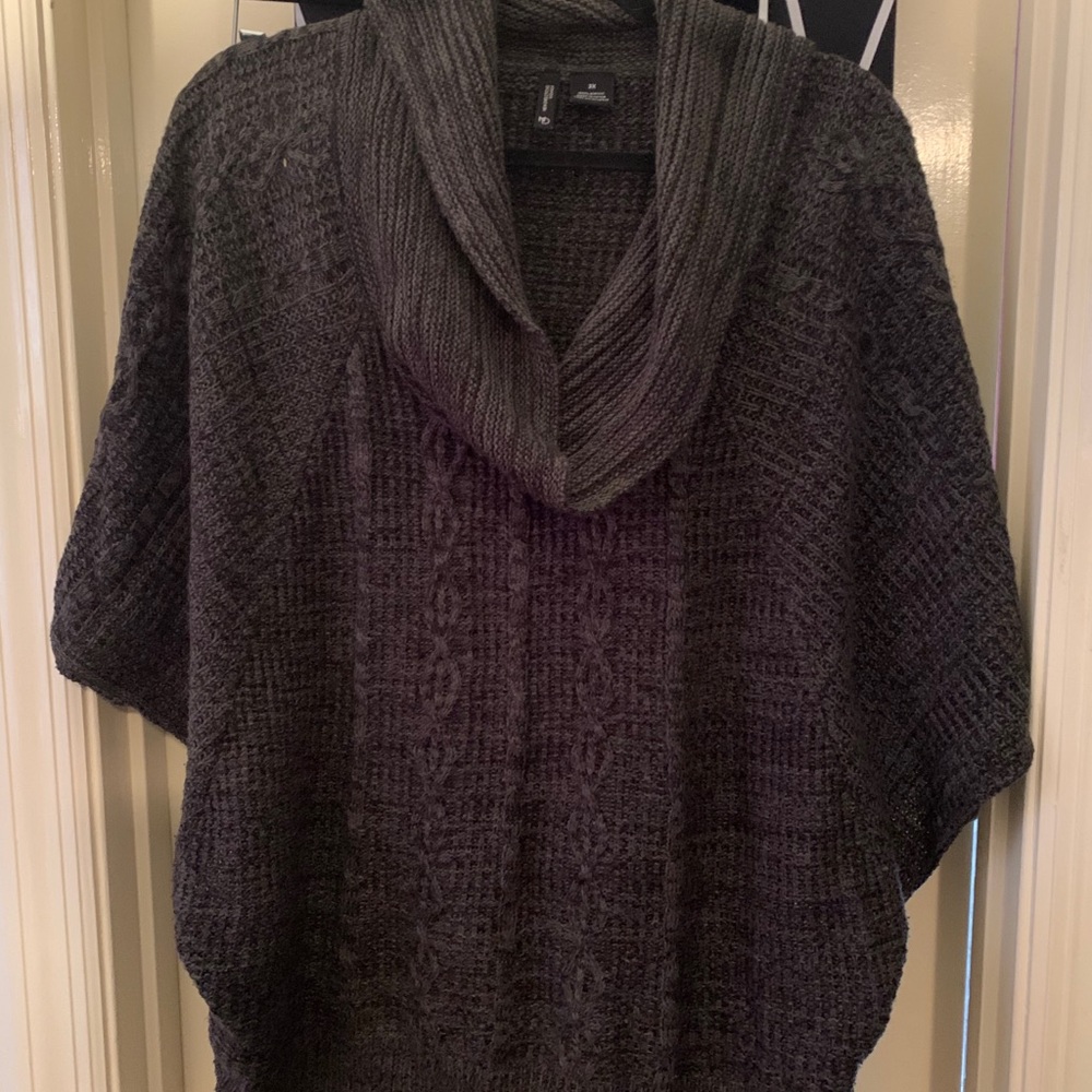Cow neck sweater with no sleeves. Gently used.